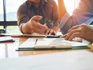 Colleagues working on a desk